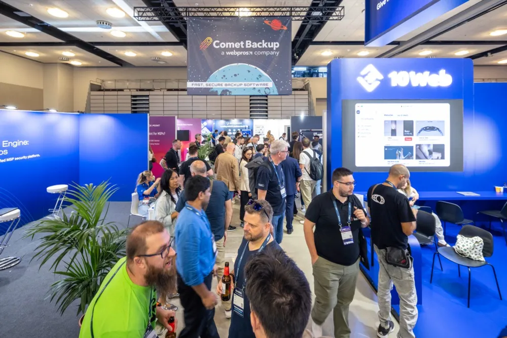 Attendees visiting the Comet Backup stand at MSP Global 2025